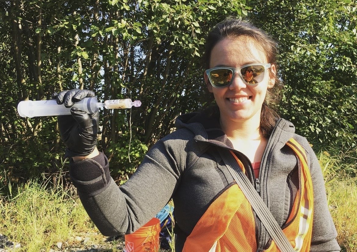Mikayla Borton holds a sample from one of the rivers.