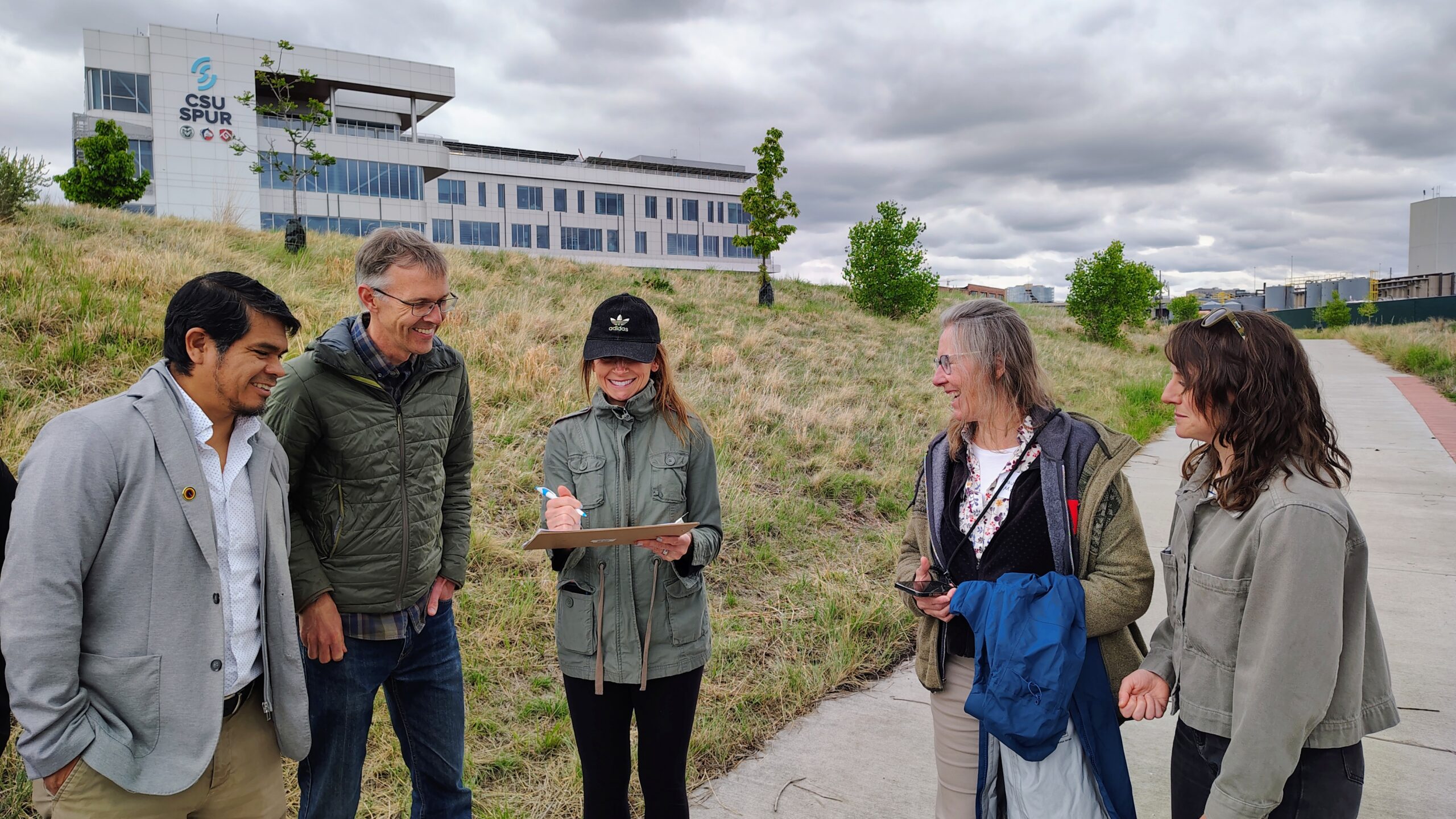 photo of educators at CSU Spur documenting environmental metadata along the South Platte River